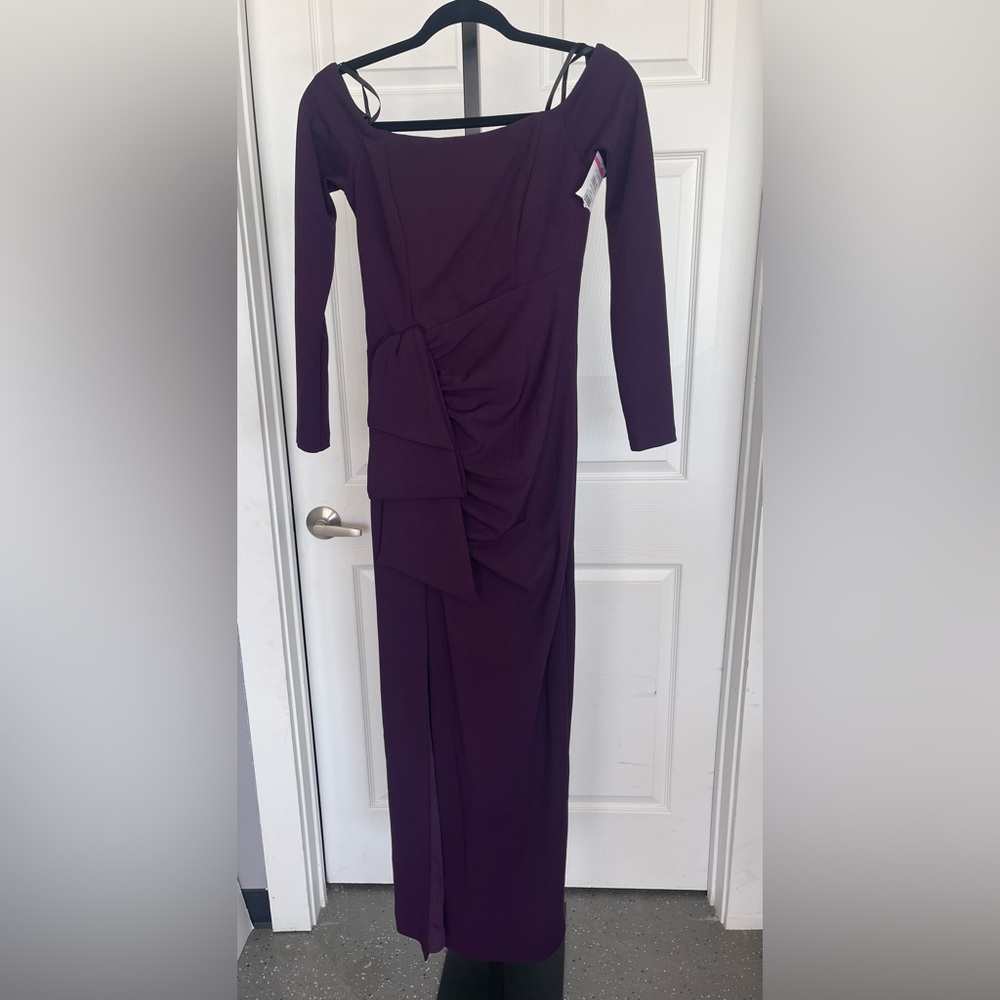 34. Xscape strapless, long sleeved maxi dress with front slit. Size 4.